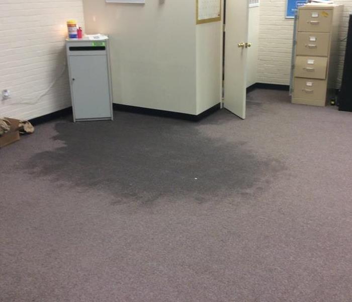 Storm causes flooding in local business.